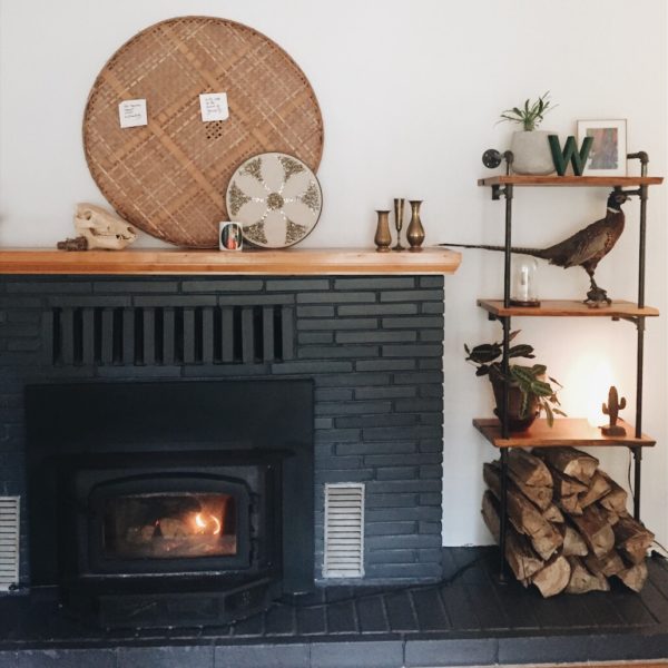 Update your brick and brass fireplace with paint