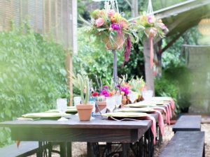 Southwest Boho Baby Shower- A boho farmhouse table tablescape for a backyard gathering.